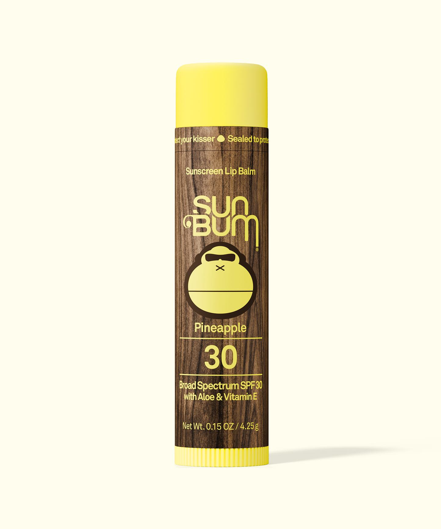 Sun-Bum-lip-balm-with-a-brown-stick= and-pink-cap-on-a-white-background-PINEAPPLE-galway-ireland-blacksheepsurfco
