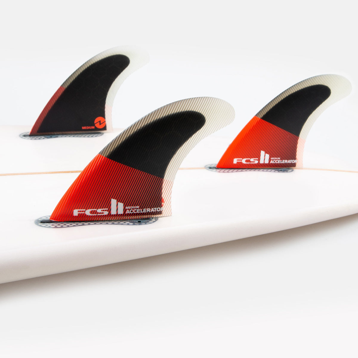 FCS-II-accelerator-large-surfboard-thurster-medium-fins-red-PC-blacksheepsurf-ireland