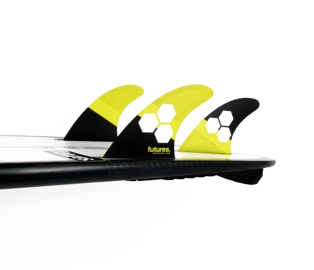 futures-am2-thruster-surfboard-fins-yellow-set-in-board